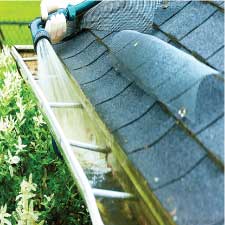 mountain men cleaning gutters